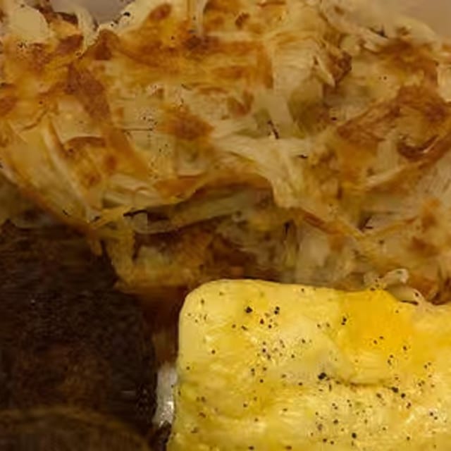 2 Eggs With Bacon Or Sausage.