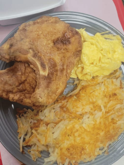 2 Eggs Any Style With Pork Chops.