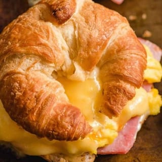 Egg and Ham, Bacon, Or Sausage on Croissant